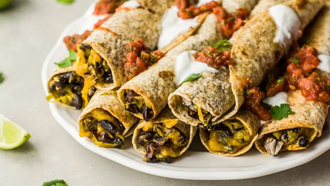 Skinny black bean flautas on a plate Skinny black bean flautas on a plate