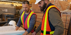 Two contractors with plans