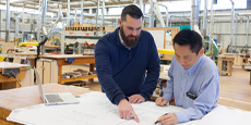 Engineer and consultant reviewing plan