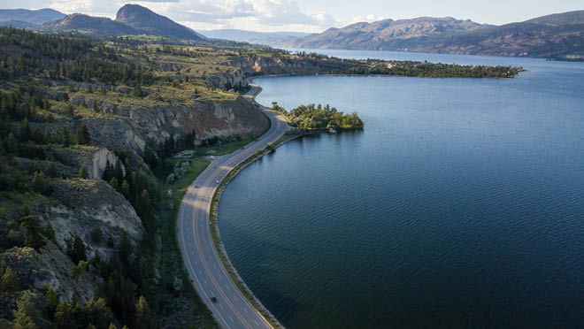 Aerial panoramic view of Okanagan Lake during a sunny summer day. Aerial panoramic view of Okanagan Lake during a sunny summer day.