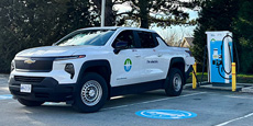 A BC Hydro branded electric F-150 Lightning charging at one of BC Hydro's public fast charging sites.